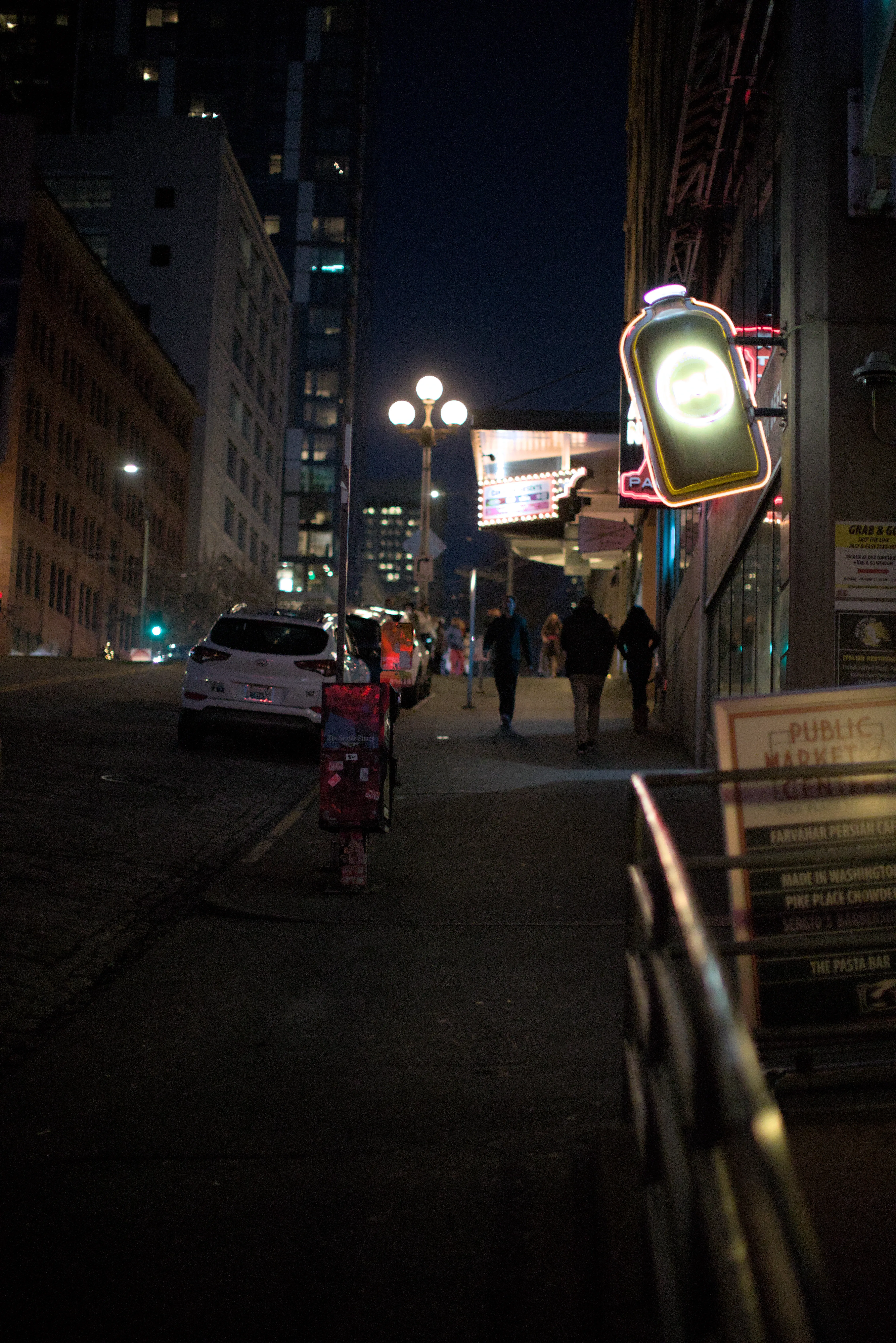 People walk near Pike Place Market