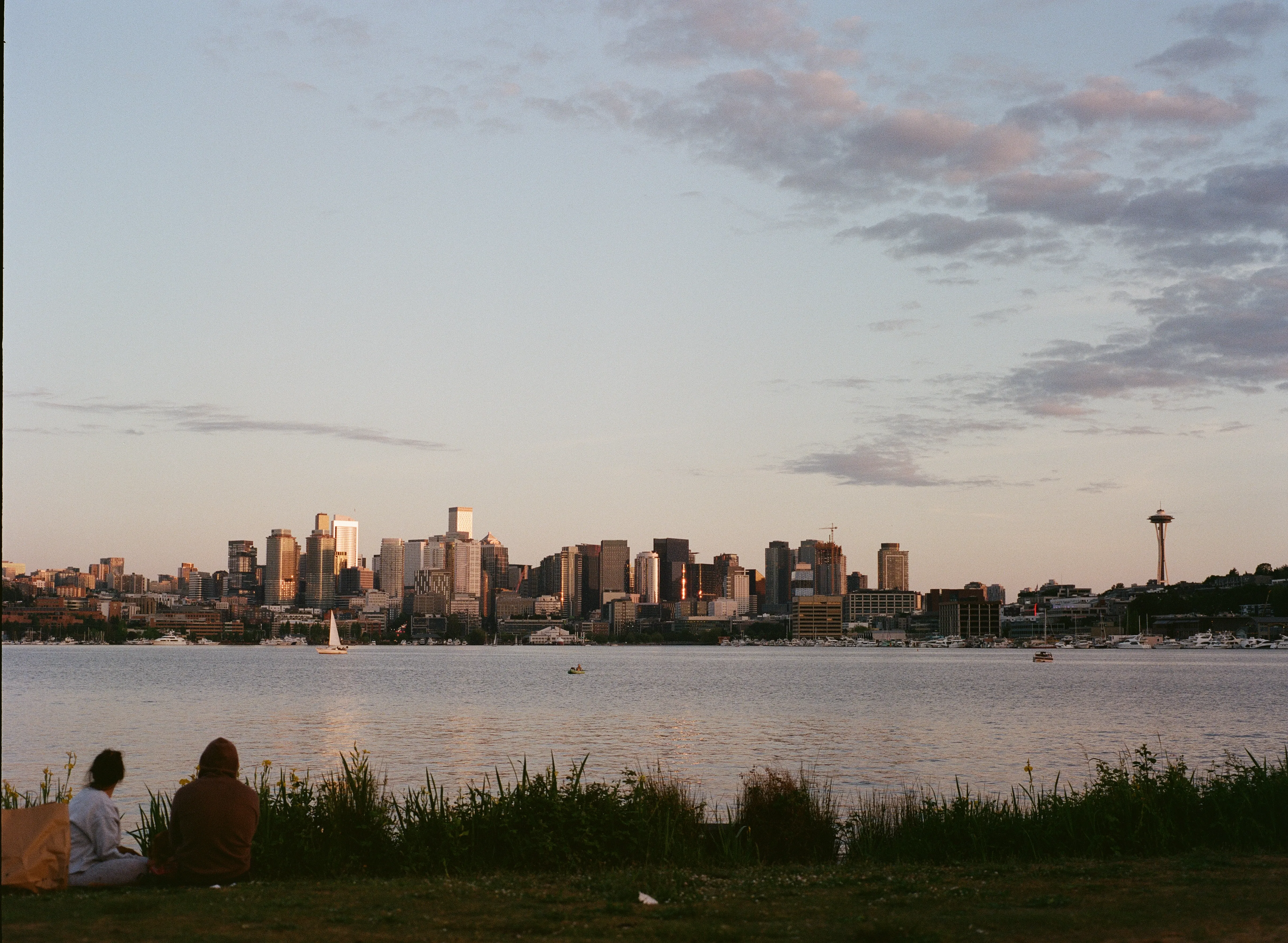 Couple looks to downtown Seattle across Lake Union